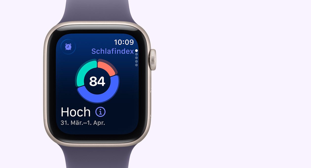 Apple Watch SE 3, Aluminiumgehäuse, Farbe Polarstern, das Display zeigt die runde Schlafindex Grafik, rechte Seitenansicht, Digital Crown, Sportarmband, Farbe Nebelviolett