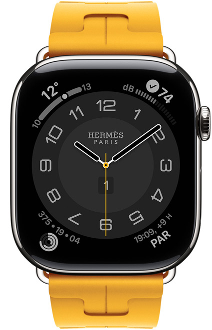 Apple Watch Hermès Series 11, quadrante Circulaire (lancette dell’ora, dei minuti e dei secondi, logo Hermès Paris, complicazioni: Meteo, anelli Attività, ora di Parigi e Indice UV), cassa in titanio color argento, lato destro, Digital Crown, cinturino Simple Tour Kilim color Jaune (giallo canarino) in fluoroelastomero