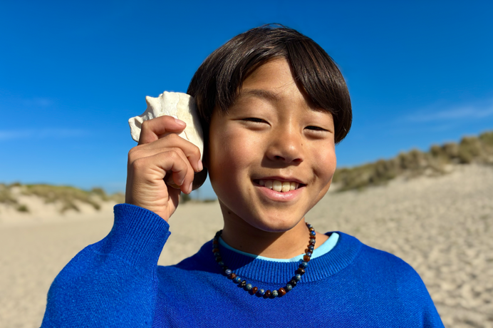 Nuotrauka, padaryta 48 MP „Fusion“ kamera naudojant naujo lygio portretų funkciją, sufokusuota į žmogaus veidą