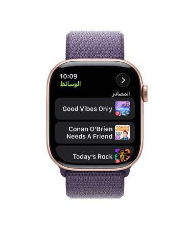 Apple Watch Series 11، لون ذهبي وردي، إطار ألومنيوم، Apple Music، اقتراحات الموسيقى والبودكاست، الجانب الخارجي الأيمن، التاج الرقمي، حزام Loop رياضي بلون ليلكي ضبابي