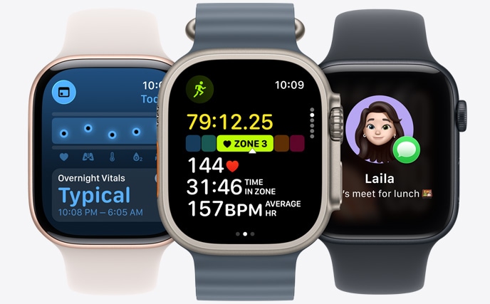 Three Apple Watch models, center in Natural color, face shows run in progress with heart rate stats, right in Jet Black, face with Genmoji, left in Rose Gold, face shows Vitals