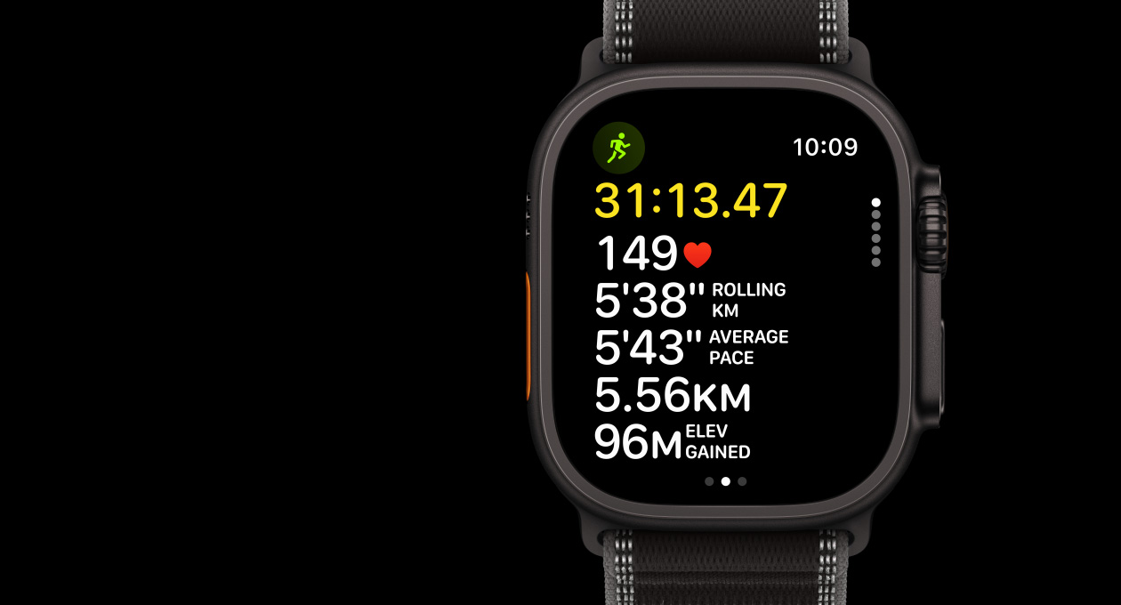 Apple Watch Ultra 3, black colour, titanium case, Workout app, Outdoor Run, left side exterior, Action button, right side exterior, Digital Crown, side button, strap, Trail Loop, black/charcoal colour