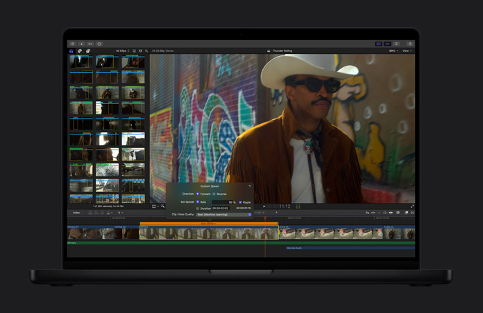 MacBook Pro 16, Demonstration of how a shot can be converted to smooth slow motion, man in cowboy hat and sunglasses with graffiti-covered wall in background