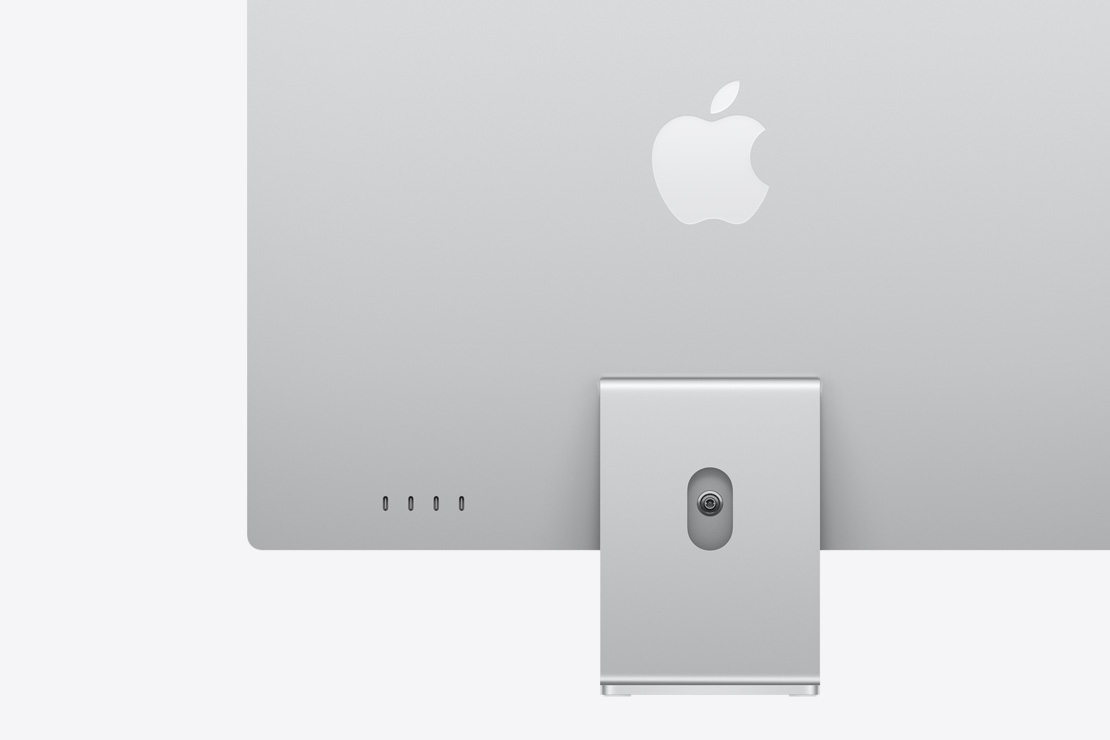 シルバーのiMacを後ろから見た図。4つのUSB-Cポートがハイライトされている