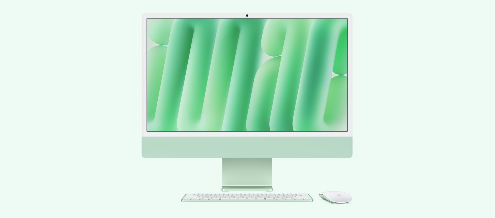 同じカラーのマウスとキーボードを合わせたグリーンのiMacを正面から見た図
