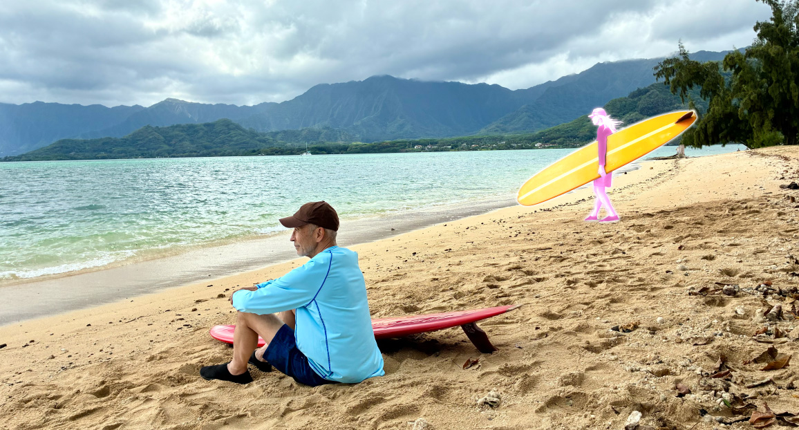 Photo of a man sitting on a beach