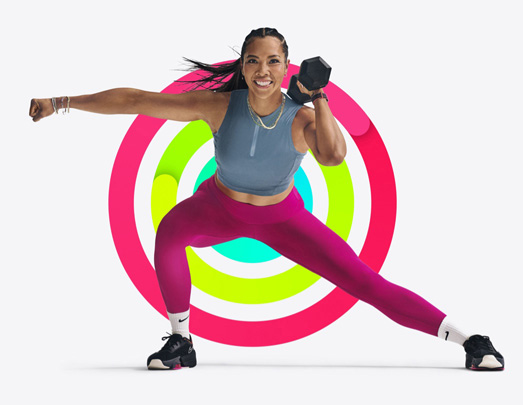 A person lifts weights in a side lunge position, Activity rings form background