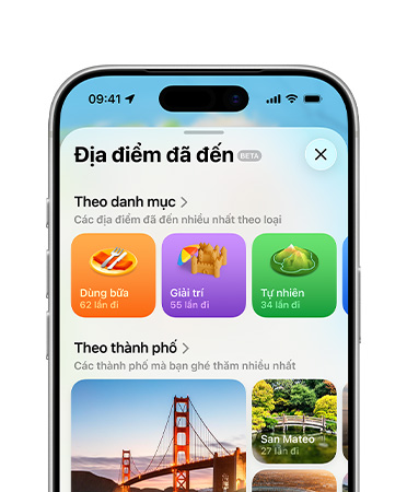 Nửa trên màn hình iPhone hiển thị tính năng địa điểm đã ghé thăm trong ứng dụng Bản Đồ, bao gồm Danh Mục và Thành Phố